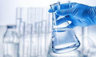 Flask with clear liquid